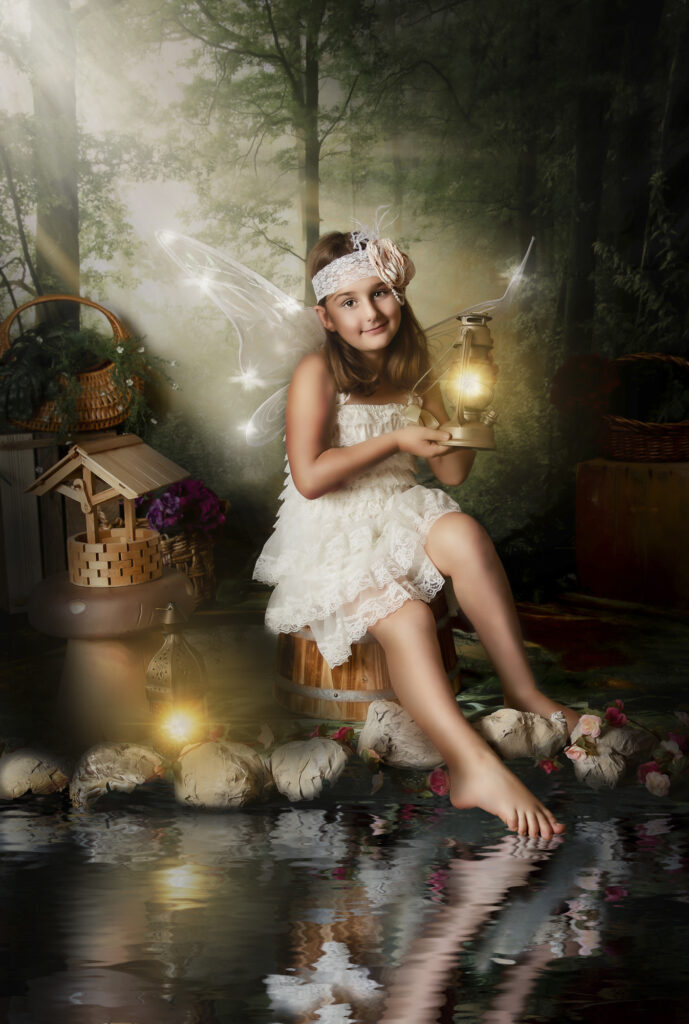 Fairy sitting in front of a pond holding a magical lantern