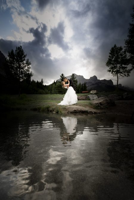 Photographer with couple in Quarry Lake, Canmore